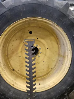 Top-down view of the torque tree slots holding an extension centered on a tractor hub